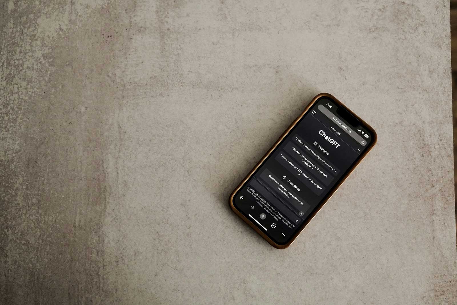 pexels-airamdphoto-15940000 A phone displaying ChatGPT, and artificial intelligence.