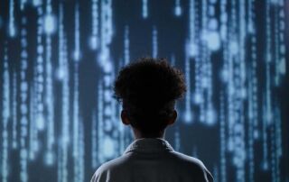 A child standing in front of a wall of AI code.
