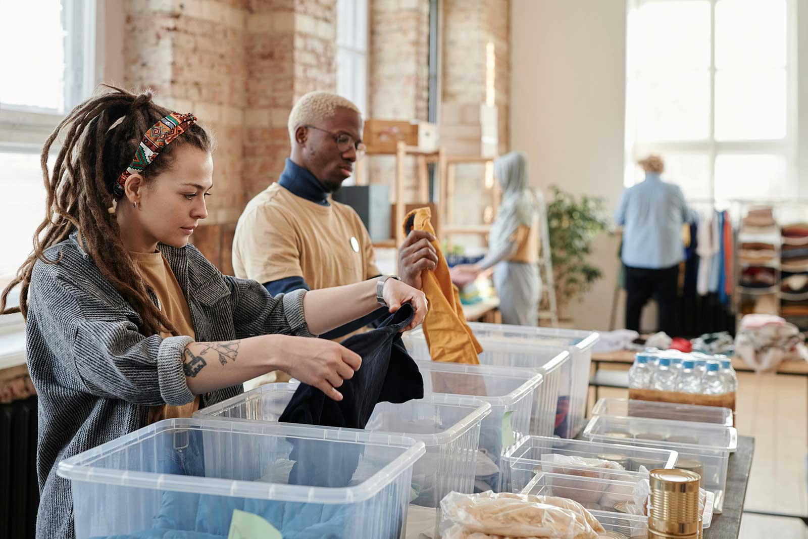Nonprofit workers in Cleveland prepare clothes for those in need.